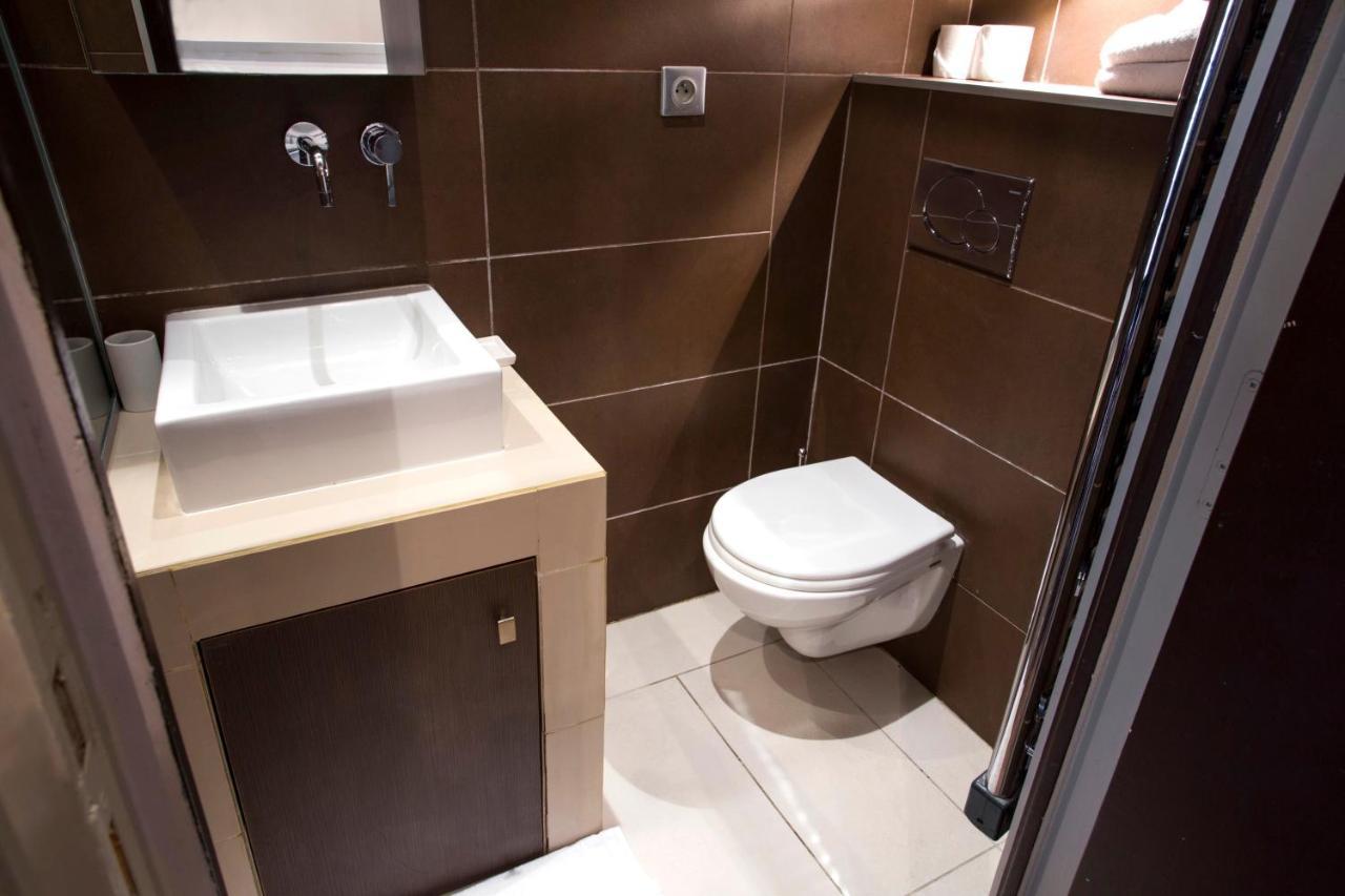 Habitat Parisien - Marais Sicile Apartment Екстериор снимка