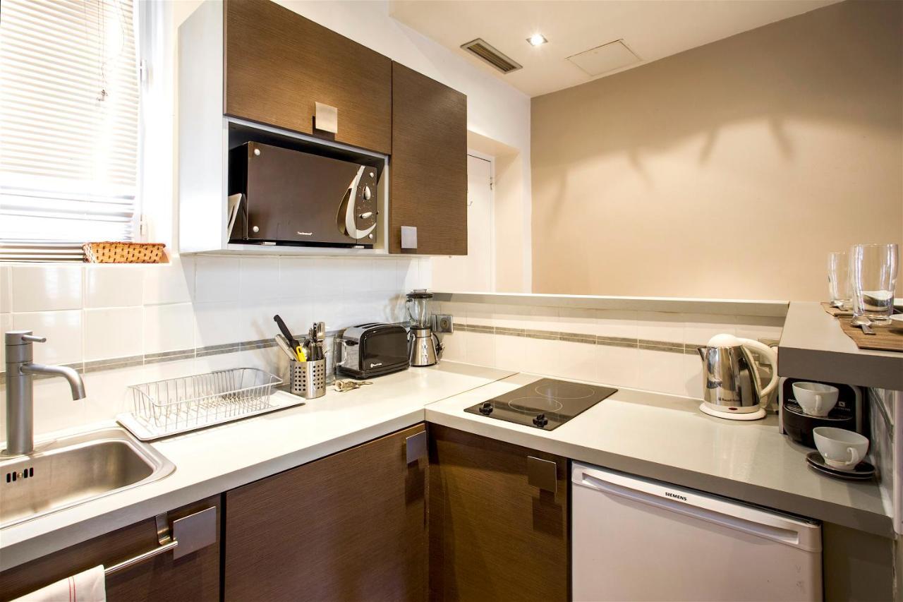 Habitat Parisien - Marais Sicile Apartment Екстериор снимка
